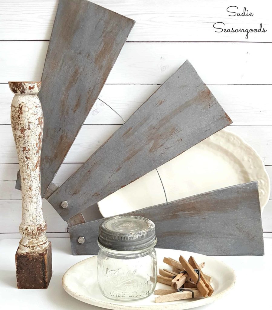 100+ Thrift Store Makeovers - Ceiling_fan_blades_to_be_repurposed_as_DIY_salvaged_windmill_farmhouse_style_decor_by_Sadie_Seasongoods