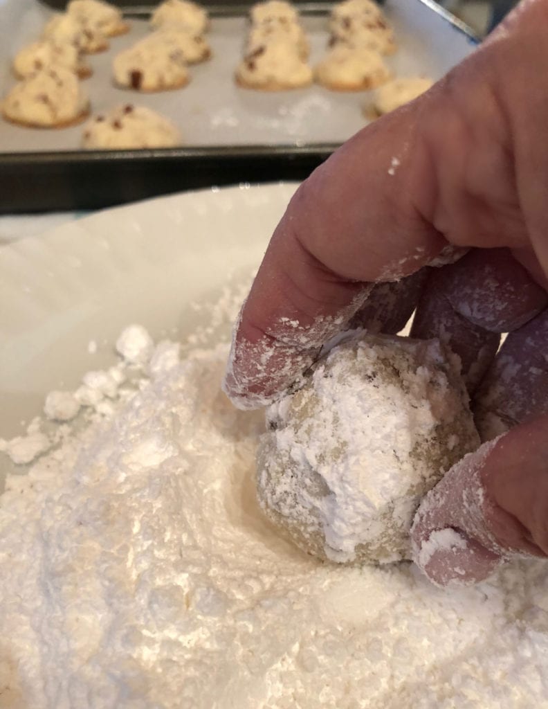 Roll in sugar - Recipe for Pecan Snowball Cookies